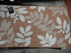 *Rug (as per photograph)