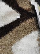 *Rug (as per photograph)