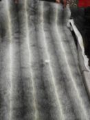 *Rug (as per photograph)