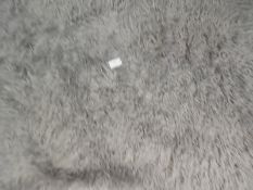 *Rug (as per photograph)