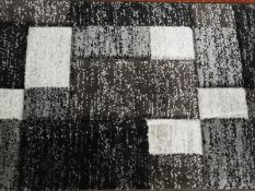 *Rug (as per photograph)