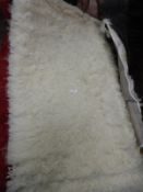 *Rug (as per photograph)