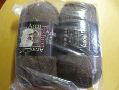 Two Large Rolls of Brown Wool