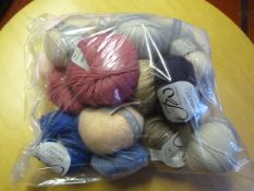 Twenty Five Small Rolls of Wool