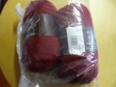 Two Large Rolls of Red Wool
