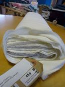 Roll of Cream Double Jersey Poly-Spandex Fabric