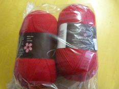 Two Large Rolls of Red Wool