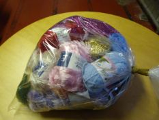 Twenty Five Small Rolls of Wool