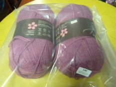 Two Large Rolls of Pink Wool