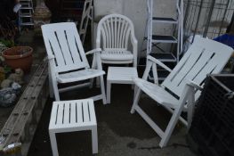 Two Folding and Two Stacking White Garden Chairs,