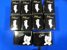 *Ten Cesar Dog Food Tins
