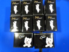 *Ten Cesar Dog Food Tins