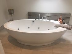 Luxurious Bathroom Suite including Jetted Bath, Shower Unit, Sink Unit with Mirror, Toilet and
