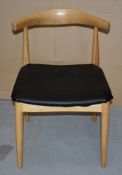 1 x Hans Wegner Inspired Elbow Chair - Solid Wood Chair With Light Stain Finish and Black Seat Pad -