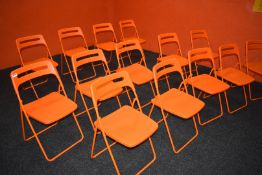 10 x Folding Chairs With Bright Orange Finish, Steel Bases and Carry Handles