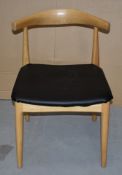 1 x Hans Wegner Inspired Elbow Chair - Solid Wood Chair With Light Stain Finish and Black Seat Pad -