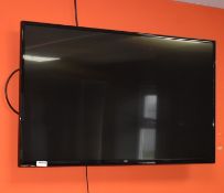 1 x Bush 49 Inch Flat Screen LCD Television With Wall Mount and Remote Control