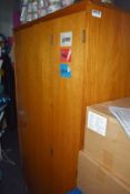 1 x Wooden Storage Cabinet With Bi-Fold Doors - H160 x W100 x D59 cms - Contents Not Included -