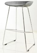 A Pair Of Modern Scandinavian Style Bar Stools Featuring Grey Fabric Upholstered Seats And Chrome M
