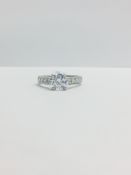 Platinum Diamond Solitaire Ring With Diamond Set Shoulders