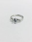 Platinum Diamond Solitaire Ring With Diamond Set Shoulders,