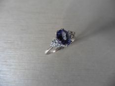 Tanzanite And Diamond Dress Ring Set In Platinum.