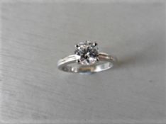 0.70Ct Diamond Solitaire Ring Set In Platinum.
