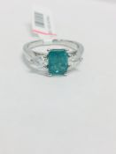 Platinum Emerald Diamond Three Stone Ring,