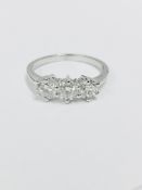 Platinum Diamond Three Stone Ring .