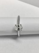 Platinum Oval Diamond Solitaire Ring.