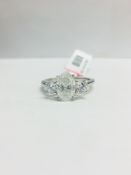 1ct Oval Diamond Trilogy style ring set in platinum
