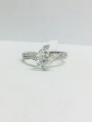 1ct Brilliant cut Diamond set in a diamond set platinum mount