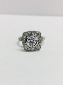 18ct white Gold Halo style diamond ring