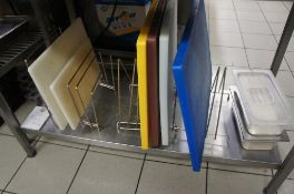 A quantity of coloured coded polyethylene chopping boards as lotted