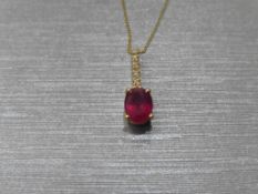 0.80Ct Ruby And Diamond Drop Style Pendant.