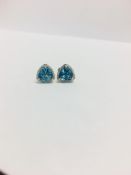 9Ct White Gold Blue Topaz And Diamond Stud Earrings,