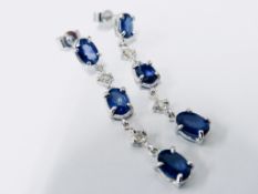Sapphire And Diamond Drop Style Earrings Set In 18Ct Gold.