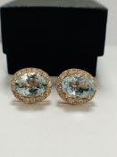 14ct Rose Gold Aquamarine and Diamond stud earrings featuring, 2 oval cut, light blue Aquamarines (5