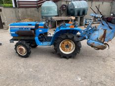 Mitsubishi compact 4x4 diesel tractor . Rotavator