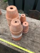 Selection of small terracotta pots