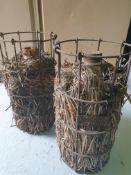 2 Vintage Glass bottle wrapped in straw in metal cage