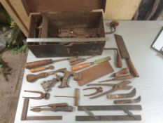 Metal box with selection of vintage tools