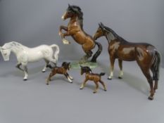 FIVE BESWICK POTTERY HORSE FIGURES, various measurements