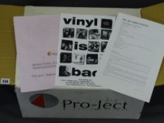 A BOXED, AS NEW, PRO-JECT AUDIO SYSTEM RECORD PLAYER E/T