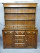 QUALITY REPRODUCTION OAK NORTH WALES TYPE DRESSER having a three shelf rack with seven spice drawers
