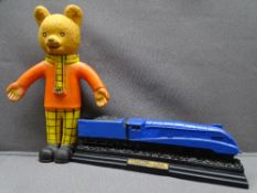STEAM ENGINE MODEL on a plinth, 'Mallard 4468' and a rubber Rupert Bear toy