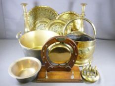 BRASS CANDLESTICKS, a good pair, 41cms H, brass helmet coal scuttle, horseshoe shaped brass gong,