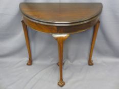 EARLY 20TH CENTURY MAHOGANY FOLDOVER BAIZE TOP CARD TABLE on slender supports with ball and claw