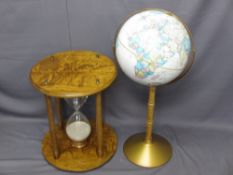 CIRCULAR HOUR GLASS TABLE and a 16in diameter globe on stand by 'Replogle World Classic Series', 62