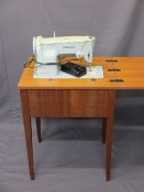 VINTAGE ELECTRIC SINGER SEWING MACHINE with foot pedal in work table E/T